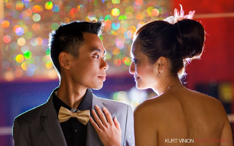 bow tie, hair piece, designer clothes, stylish couple, looking at each other, beautiful light