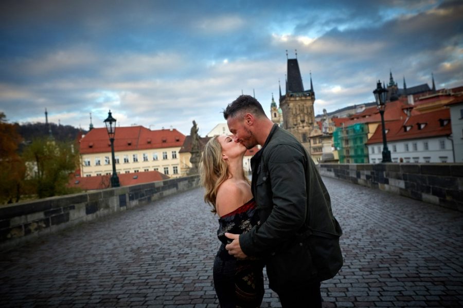 C+M  lifestyle photo session that became a surprise marriage proposal near the Charles Bridge. Photography by Kurt Vinion